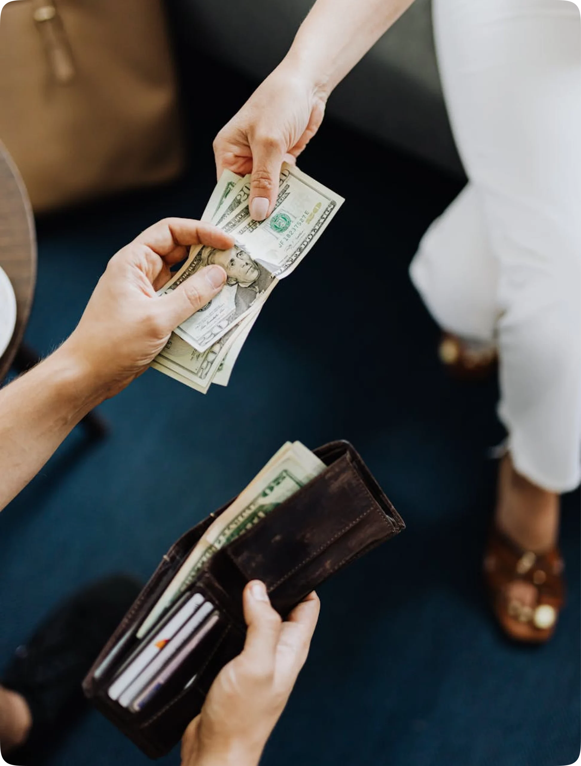 Desktop computer and smartphone on desk showing PointsKash fintech interface