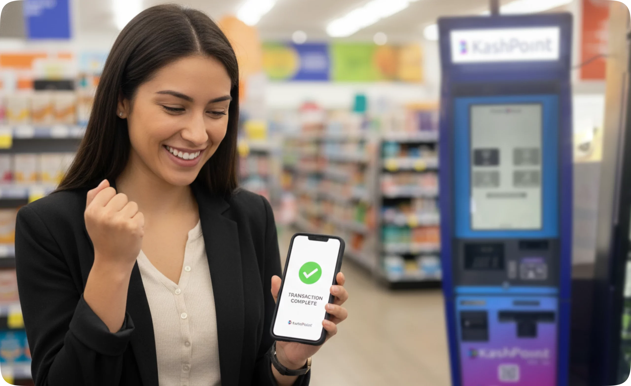 Laptop and smartphone on a desk showing PointsKash fintech interface